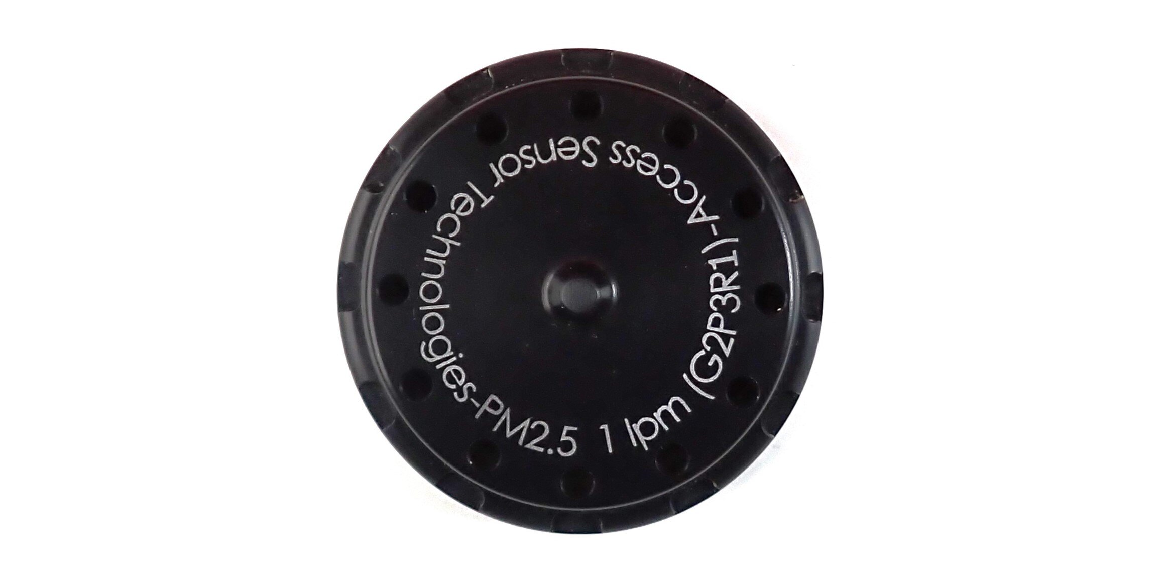 Photograph of a PM2.5 1 LPM inlet for particulate matter samplers sold by Access Sensor Technologies. This inlet consists of a round aluminum cap that is approximately 2 inches in diameter and anodized black.